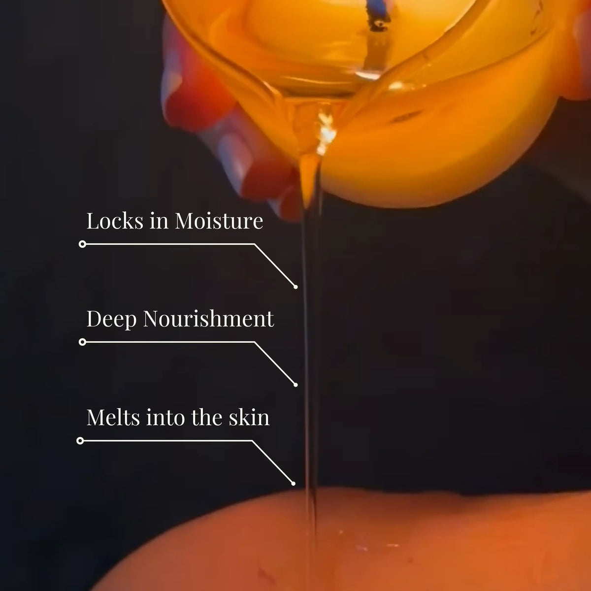Golden body oil pouring onto skin, highlighting moisture, nourishment, and absorption.