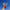 Hand holding three sunset-colored gradient taper candles against a clear blue sky.