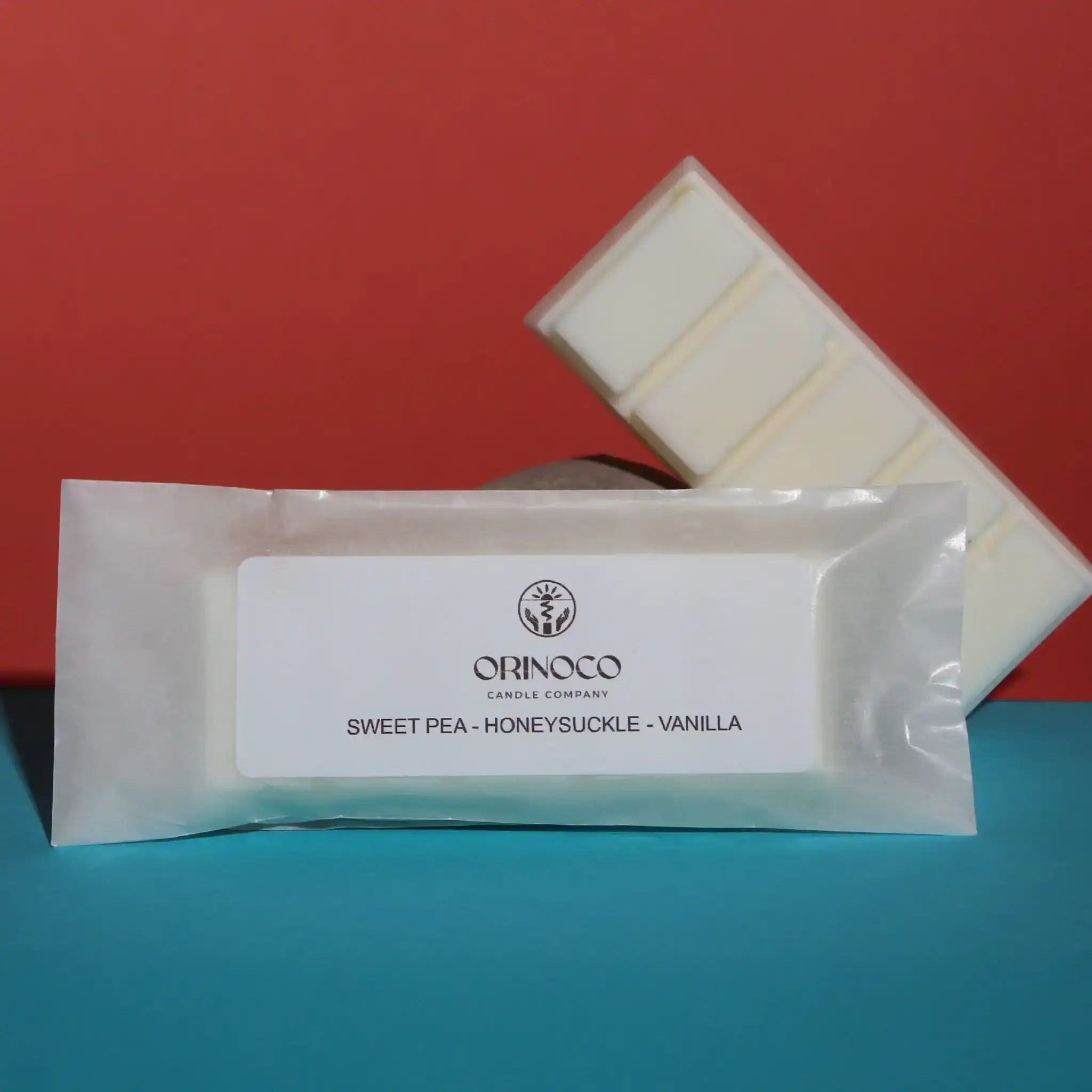 Orinoco Candle Company Sweet Pea, Honeysuckle, and Vanilla scented wax melts bar.